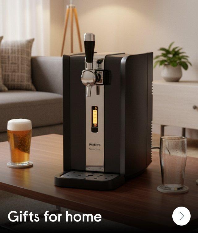 A beer dispenser on a coffee table in a living room