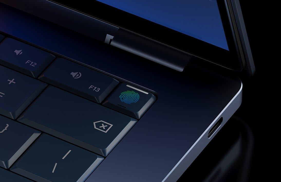 Close up of a fingerprint button on a laptop keyboard