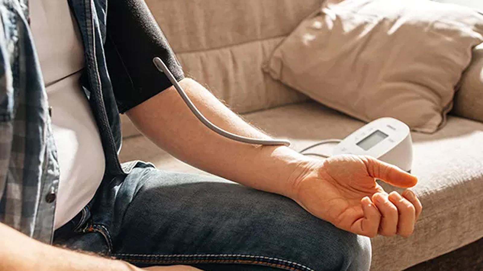 An upper arm blood pressure monitor with cuff