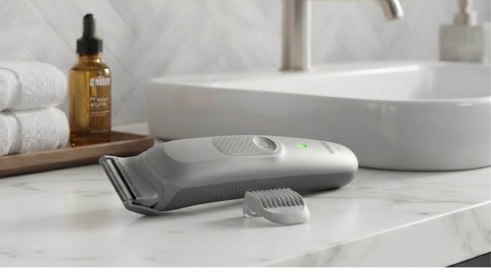 Body trimmer and intimate grooming device