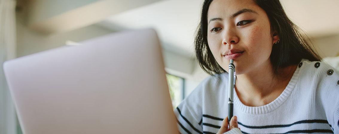 A student working on a laptop