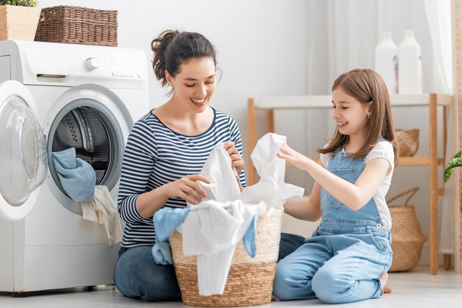 Baby & woman with washing