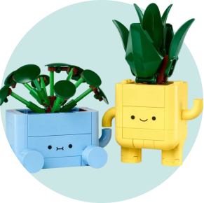 Two LEGO plant pots holding hands