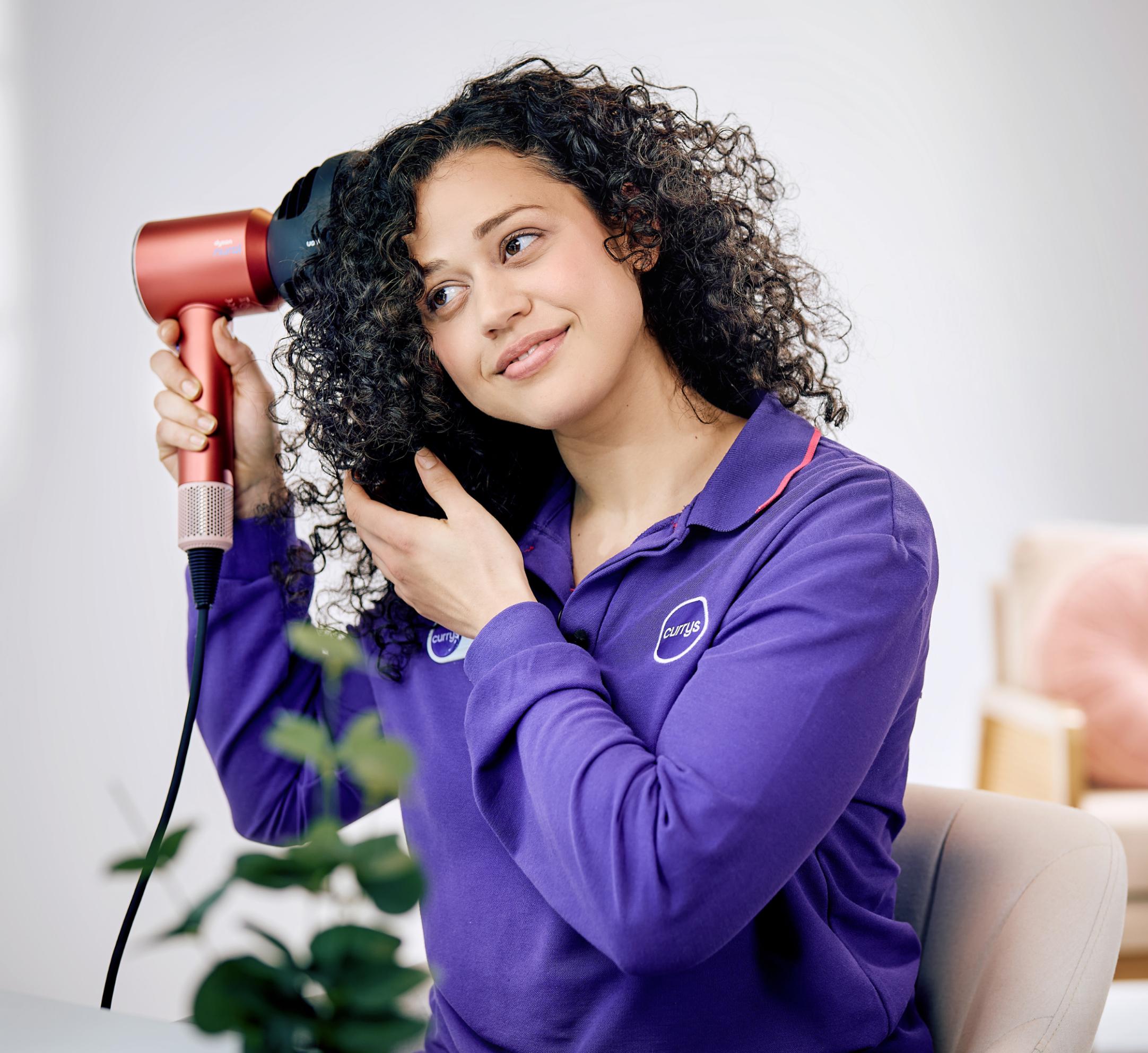 Lady styling her hair