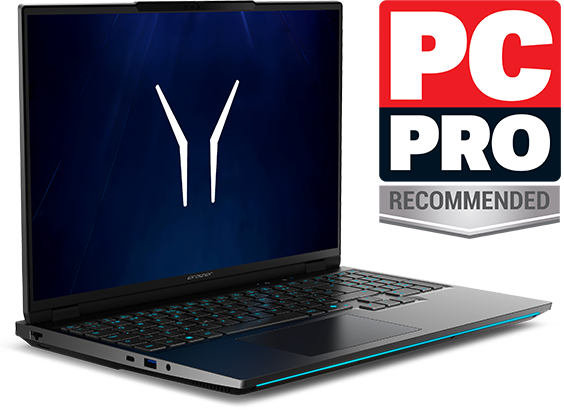 a black laptop with a PC Pro recommends label next to it