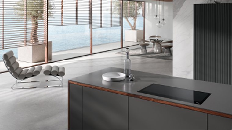 A modern kitchen with a focus on a built-in hob