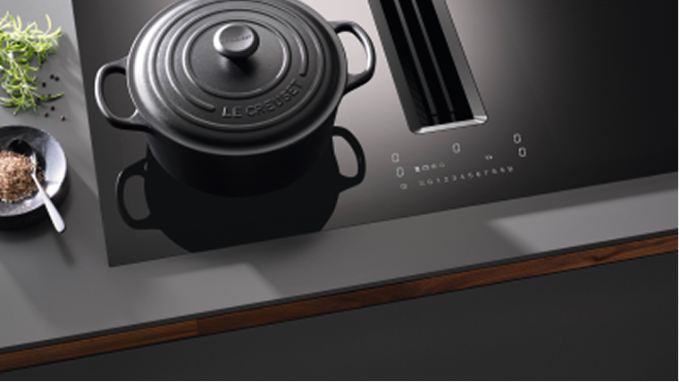 A hob with a pan on it