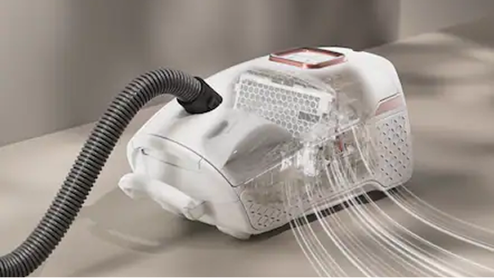 A vacuum cleaner with air over the top of it