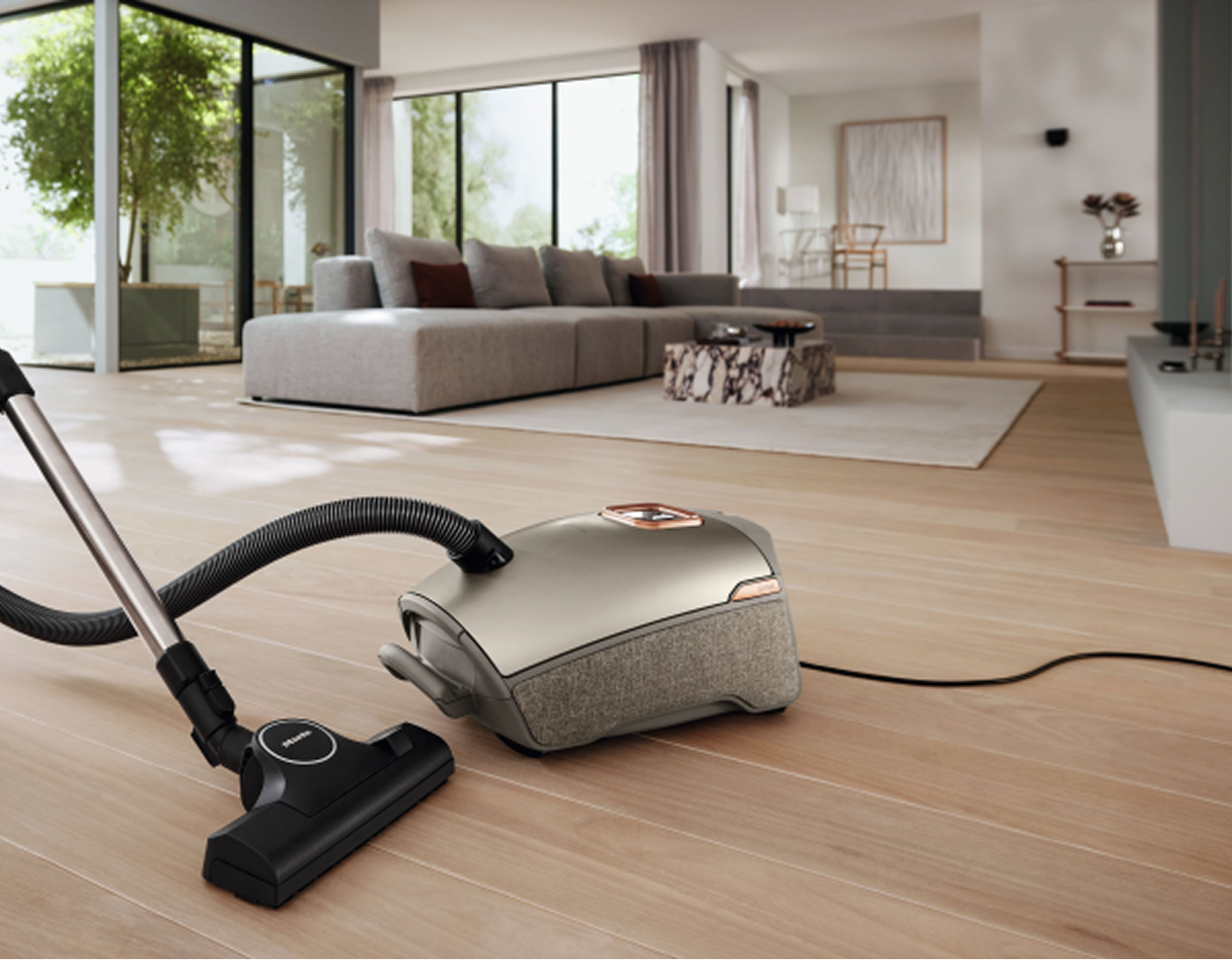 A bagged vacuum cleaner in a living room