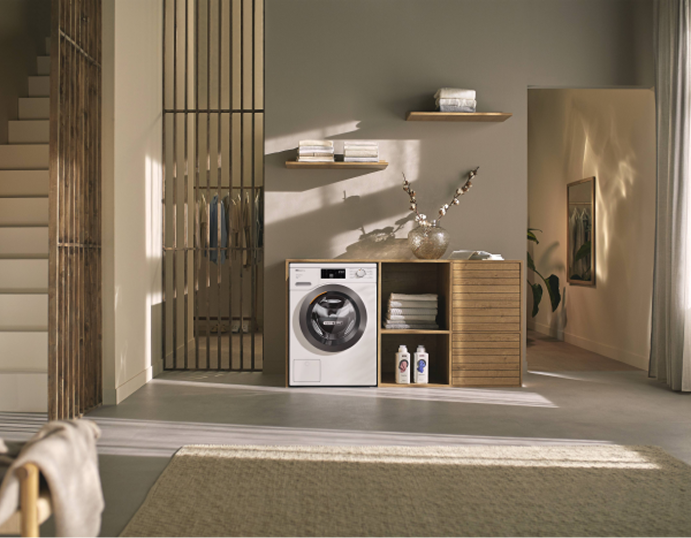 A washer dryer is in a large open room