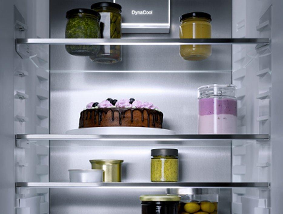 Inside a fridge with food on the shelves