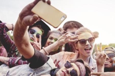 using phone at a festival
