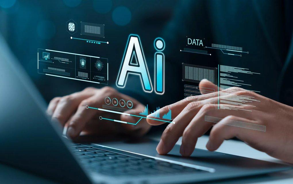 Hands typing on a laptop with Ai overlaid on top