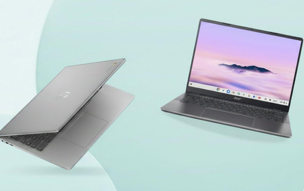 Two laptops on a green background