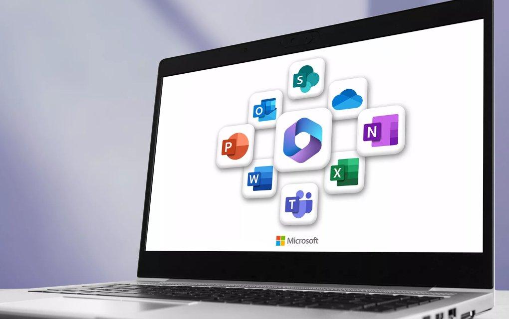A laptop with Microsoft icons on the screen