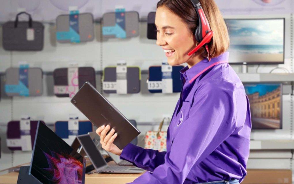 A Currys colleague instore on a video call