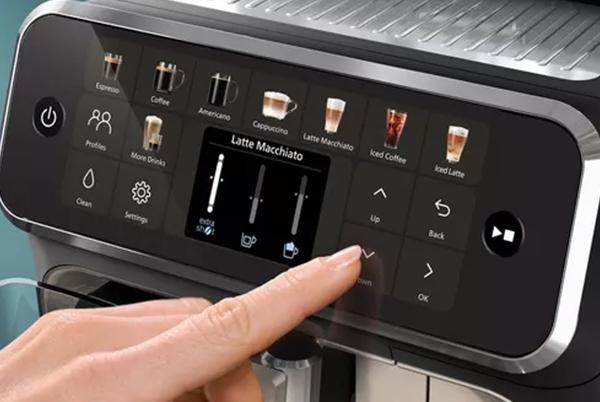 a person is using a touch screen to operate a philips lattego 5500 coffee machine