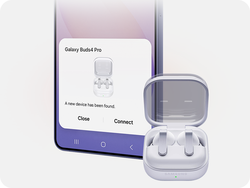 A pair of earbuds in front of a smart phone