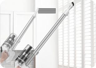 a small cordless vacuum cleaner used to clean a window