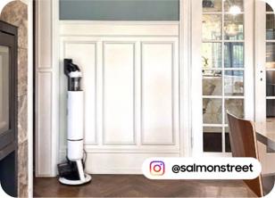 an a vacuum clearner next to a door