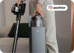 Samsung Samsung clean station being used to empty the vacuum cleaner
