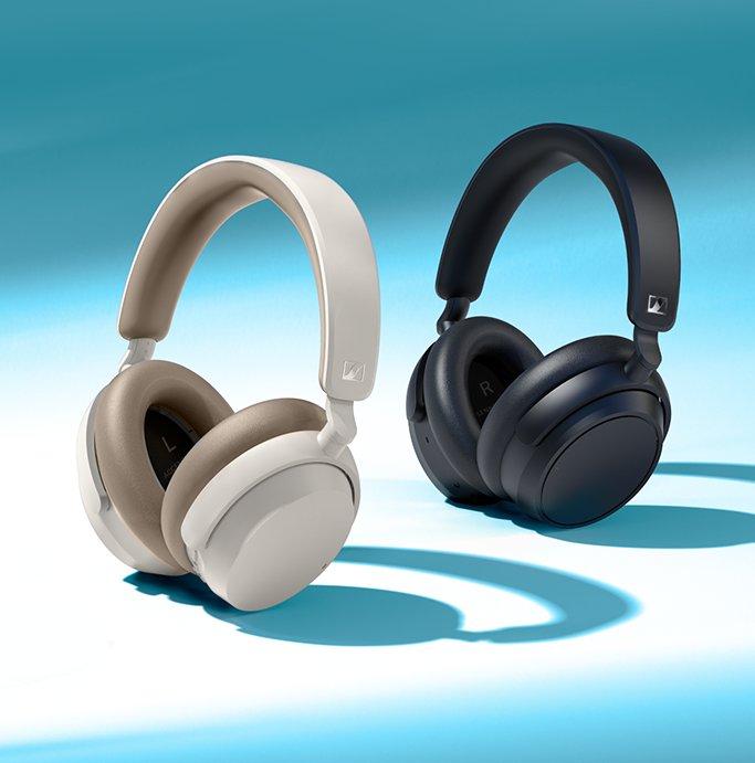 Two pairs of over-ear headphones; one white and one black