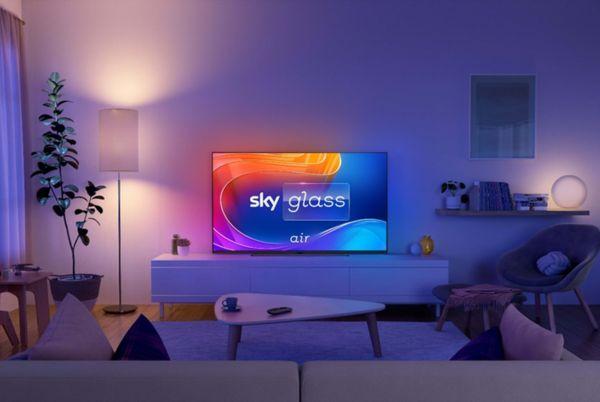 a living room with a Sky Glass Air tv and a couch