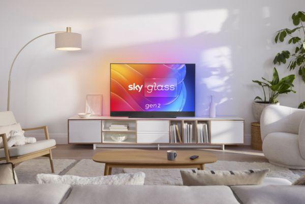 a living room with a Sky Glass Gen 2 tv on a stand in the middle of the room