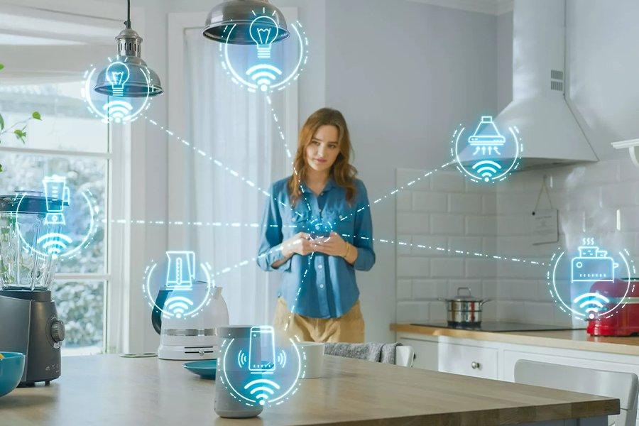 a woman holding a smart phone in a kitchen surrounded by home icons