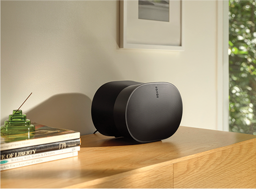 An Era 300 speaker on top of a wooden surface
