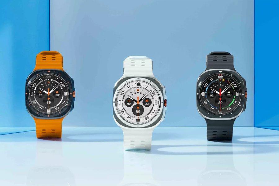 three watches on a blue background