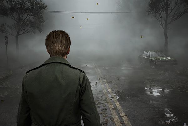 a man in a green jacket standing in the middle of a street