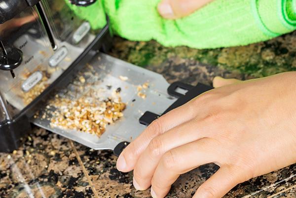 Cleaning out the crumb tray