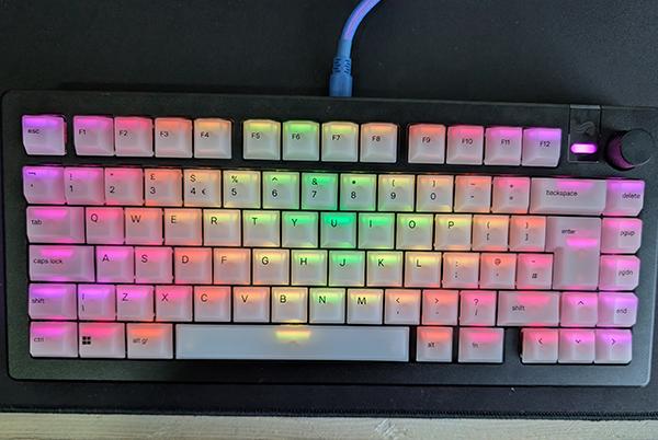 a keyboard with a rainbow of colors on it
