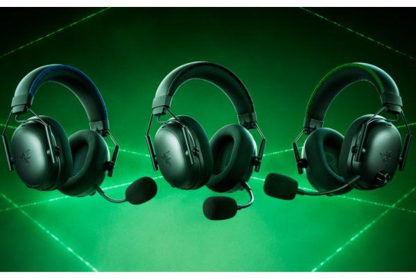 three Razer BlackShark V3 Pro headsets are shown on a green background