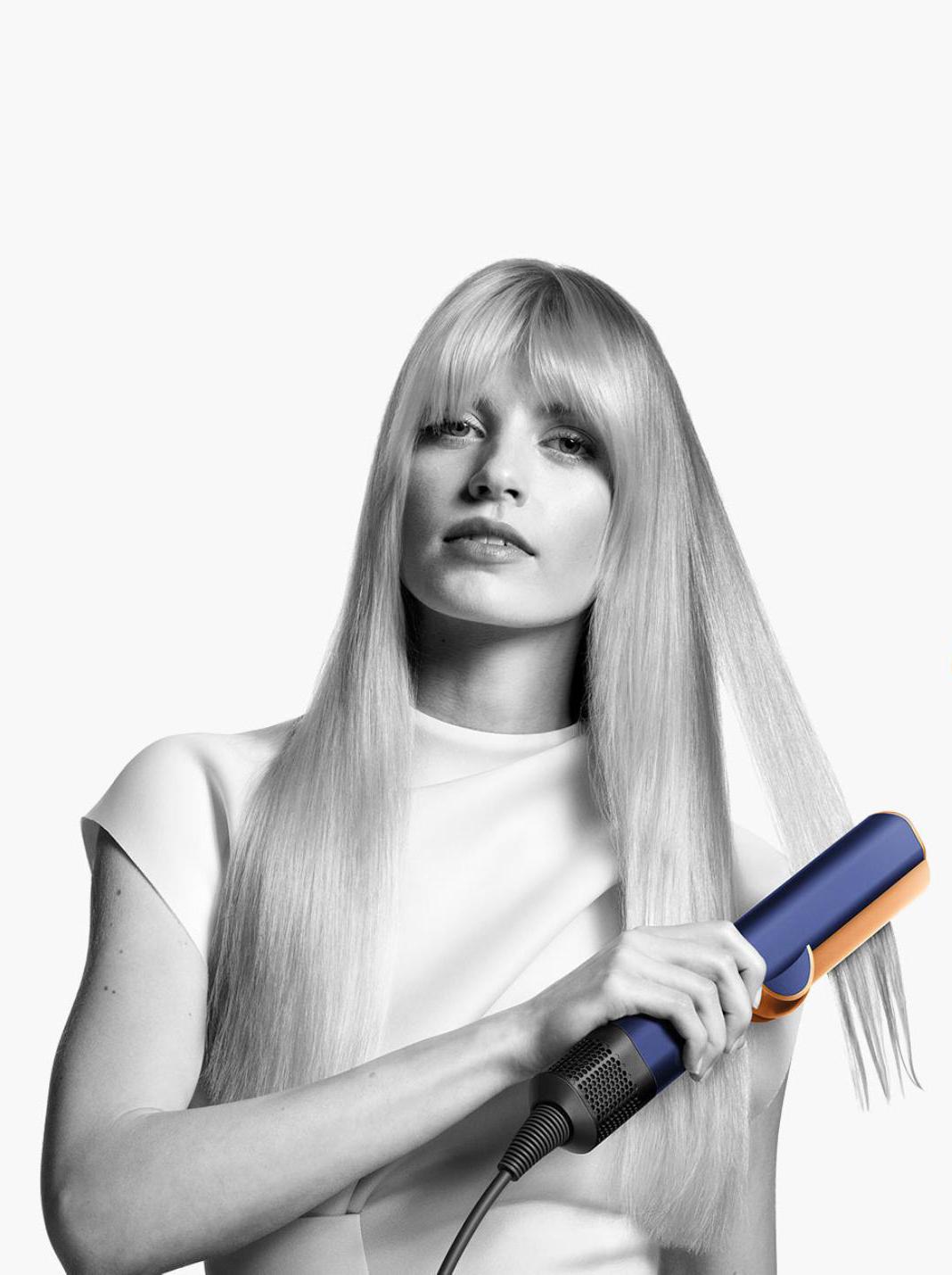 Person uses Dyson Airwrap