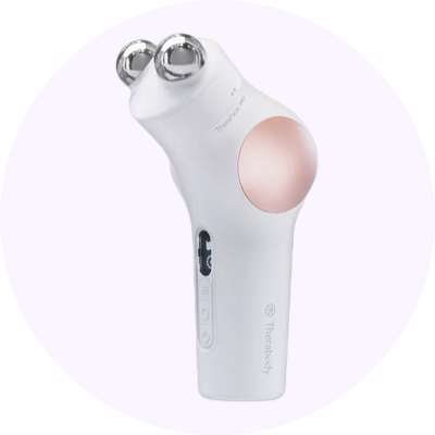 a white and pink face massager
