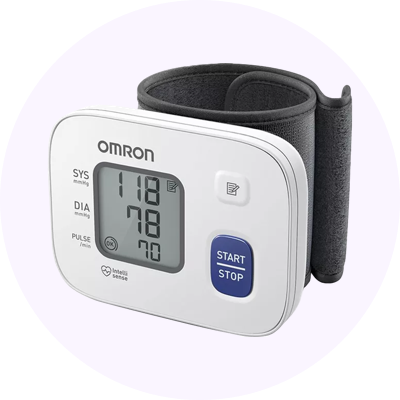 a digital blood pressure monitor with a black and white background