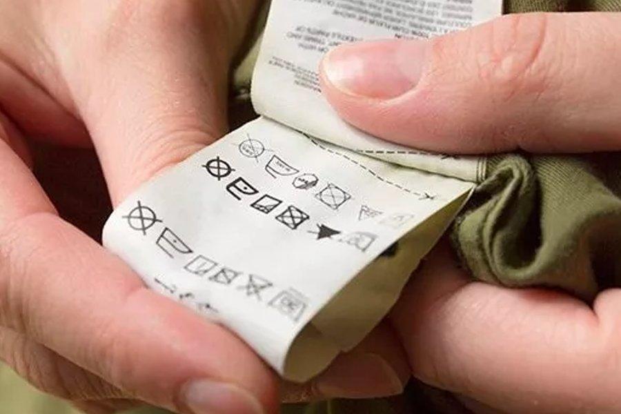 Close up of a washing label on an article of clothing