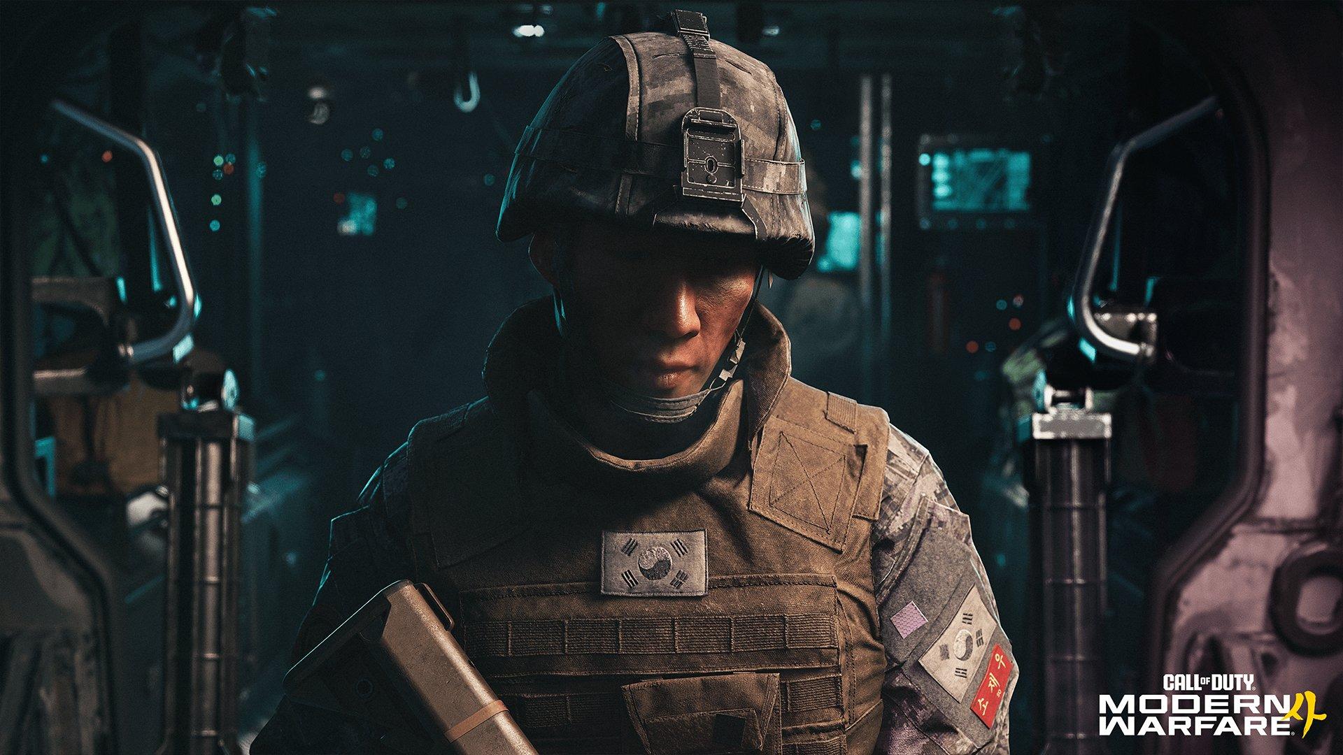 A soldier wearing a helmet and holding a gun