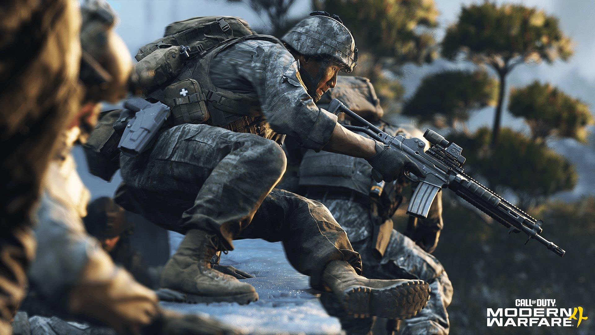 A soldier is pointing a gun forwards as they jump off a snow covered surface