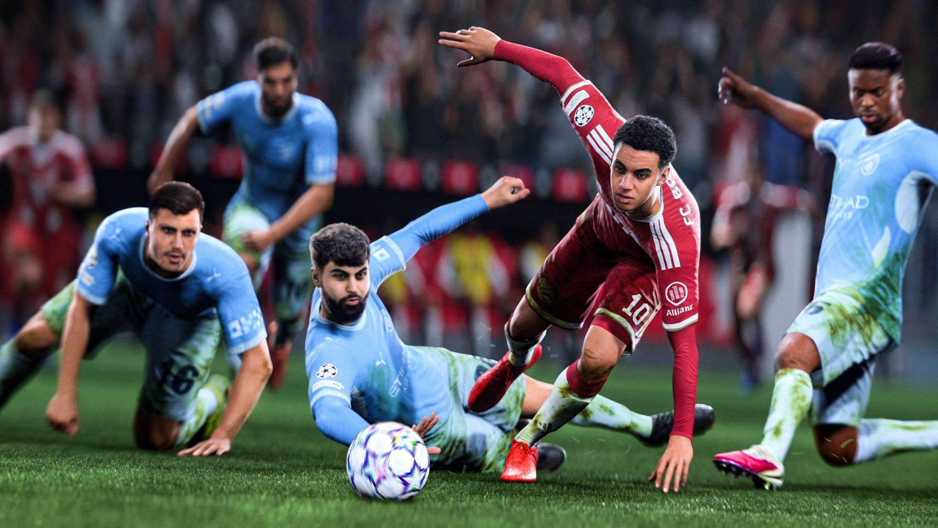 Four football players in blue kit are trying to get the ball from a player in a red kit