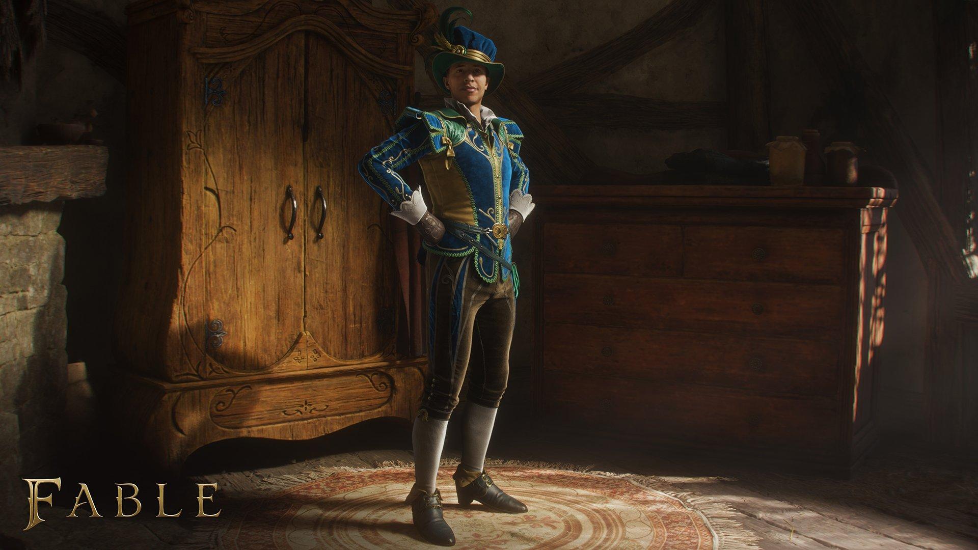 A man wearing a fancy blue outfit standing in a bedroom