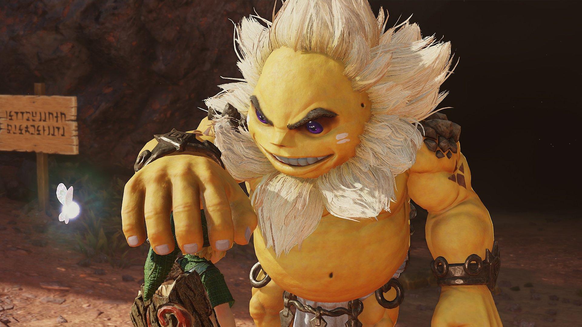 A yellow creature holding up Link