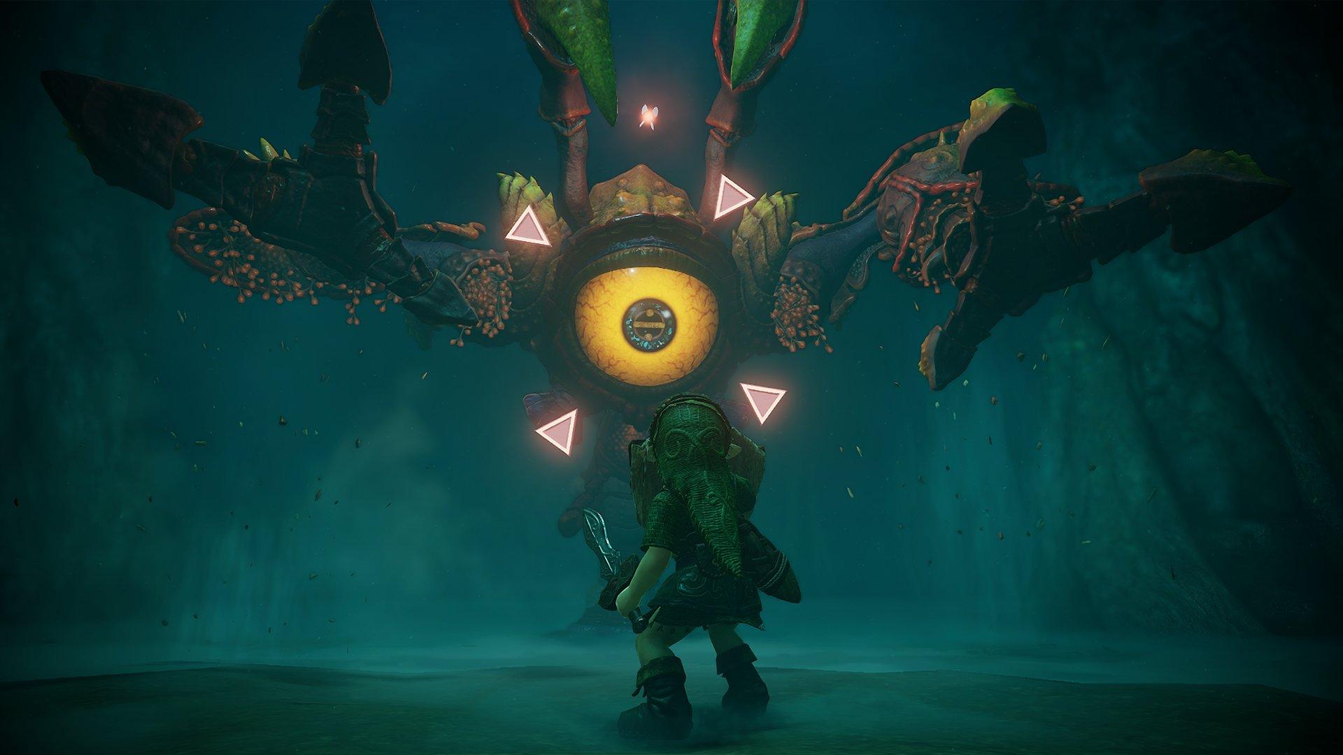Link standing in front of an massive eye with appendages