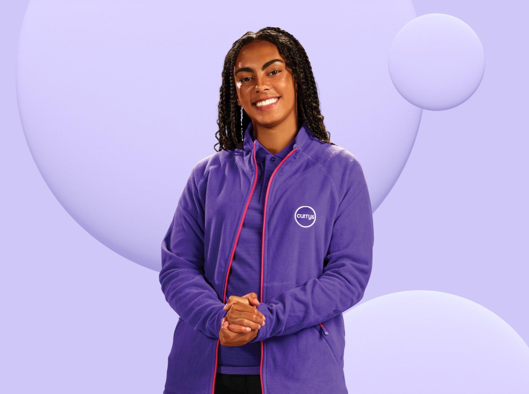 a Currys colleague on a purple background