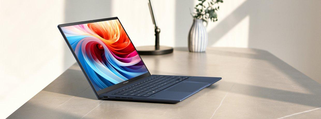 An ASUS laptop on a table